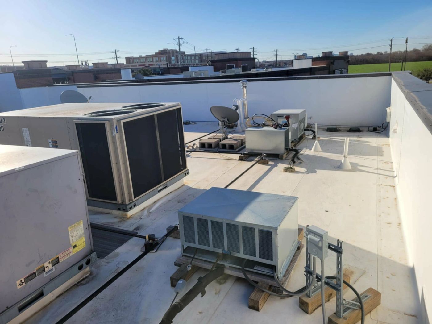 Commercial rooftop HVAC units serviced by Alvis Mechanical in North Texas